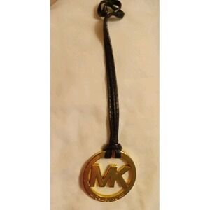Michael Kors Gold Tone MK Logo Charm Hang Tag Luggage color Leather Strap